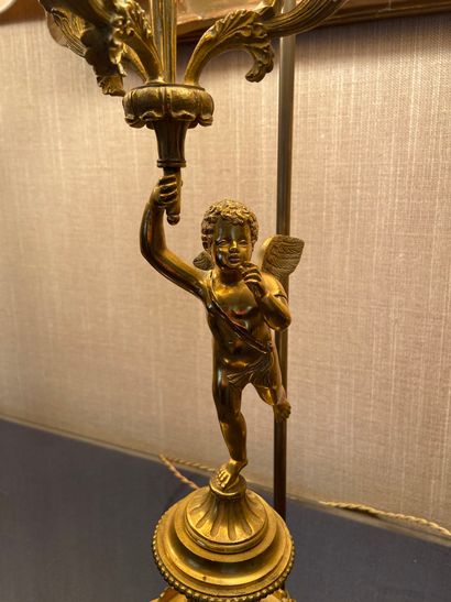null Pair of four-light gilt bronze candelabra with cherubs decoration 

Empire Style

...