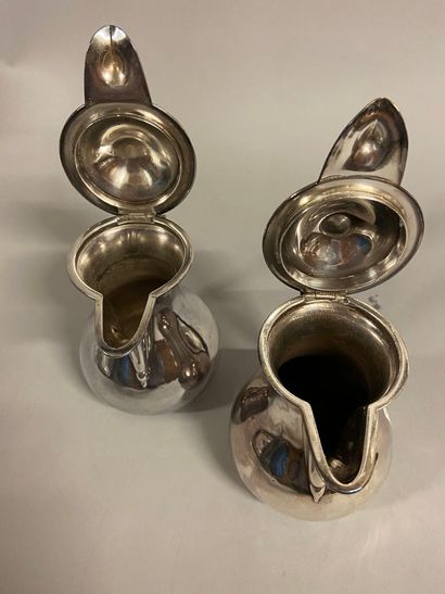 null 
Silver plated metal set including a milk jug, ERCUIS. H: 14 cm 




Set of...