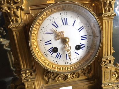 null Gilded bronze mantelpiece: clock and two candelabras_x000D_.

End of the 19th...