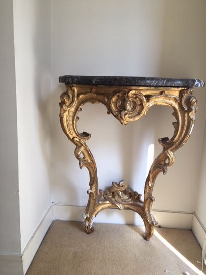 null Gilded wood console with rocaille decoration of shells and scrolls _x000D_.

Louis...