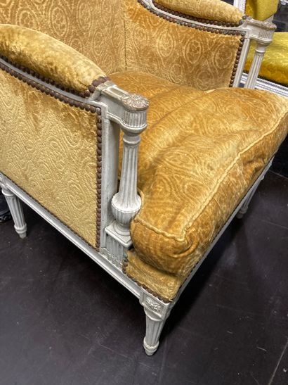 null Set including a Louis XVI style armchair with a flat white relaqued back and...