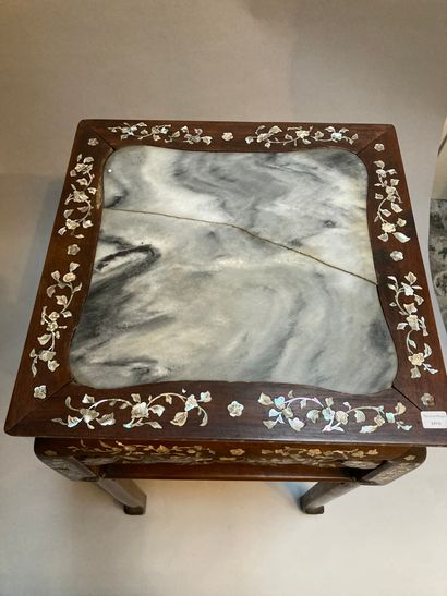 null Square wooden saddle with mother-of-pearl inlay, marble top (split)

Missing,...