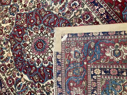 null Set of two Persian carpets on cream background, one with central medallion decoration...