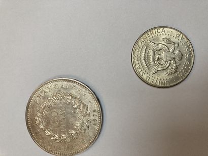 null Set of two 50 franc coins, one 100 franc coin and one half dollar coin.

Lot...