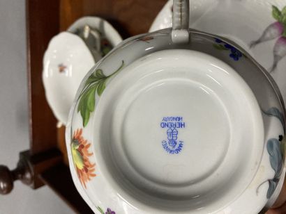 null Mannette comprising parts of services with cups and saucers, white plates and...