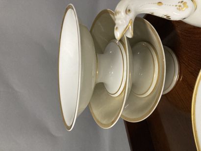 null Lot of white and gold porcelain including cups, teapot, cups on pedestal, plates,...