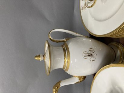 null Porcelain tea/coffee set with cups and saucers. A large set of plates, with...