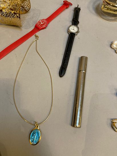 null Lot of fake jewelry and miscellaneous trinkets including a pair of YSL earrings,...