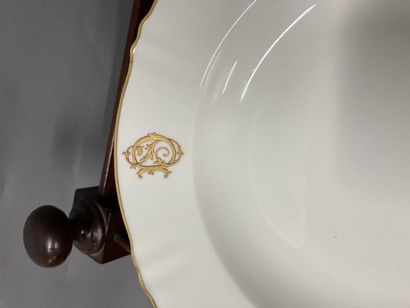 null Large batch of white and gold porcelain, some monogrammed SD, including soup...