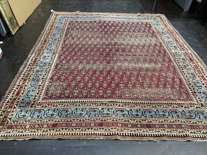null Persian carpet red background with boteh decoration

wear and tear lot sold...