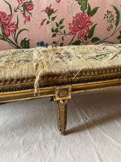 null NAPOLEON-ERA BENCH III

XIXTH CENTURY

Moulded, carved and gilded wood, tapered...