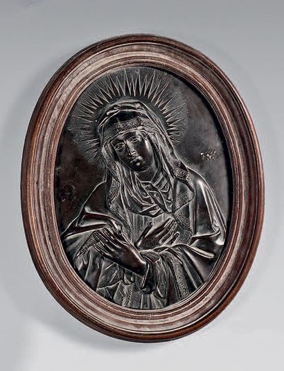 null Chased bronze bas-relief with brown patina representing a "Mater Dolorosa";...