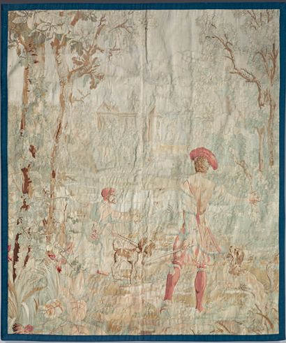 Tapestry with hunters and their dogs in the...