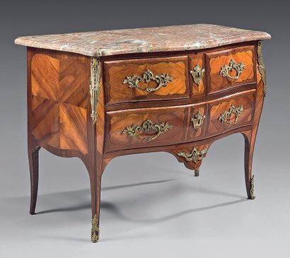 Chest of drawers inlaid with rosewood quartefeuille...