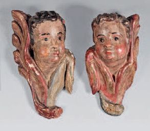 null Paire de têtes d'anges en cul de lampe en bois polychromé.
Italie, XVIIIe siècle.
H :...