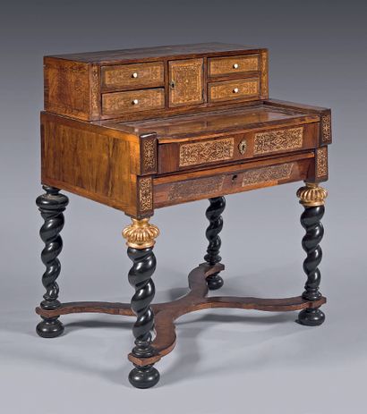  A rosewood veneer and marquetry desk in...