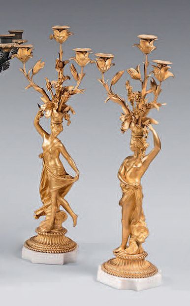 Pair of three-light candelabra in chased...