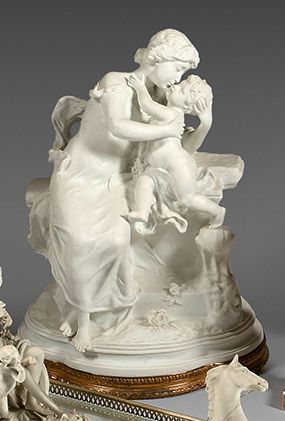 Suzanne BIZARD (1873-1963) Biscuit representing an allegory of maternal love. Signed...