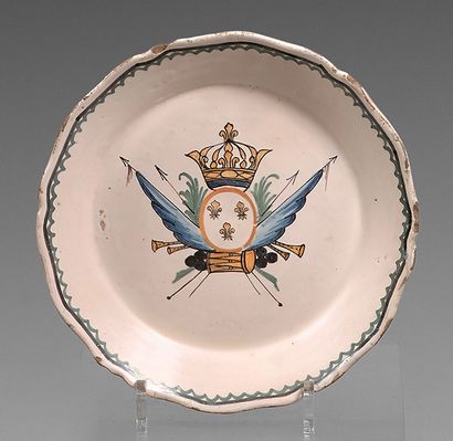 NEVERS Earthenware plate with contoured border, with polychrome decoration of three...