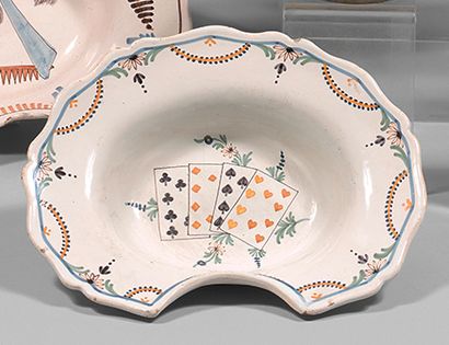 NEVERS Oval earthenware beard dish with a contoured border, with polychrome decoration...