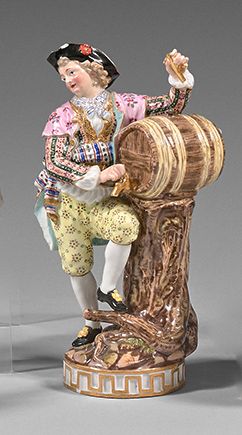MEISSEN Porcelain group featuring a man serving himself at a barrel near a tree stump...