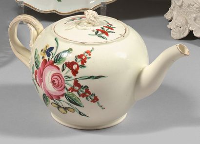 null Late 18th century English (Staffordshire) fine earthenware teapot and lid.
Polychrome...