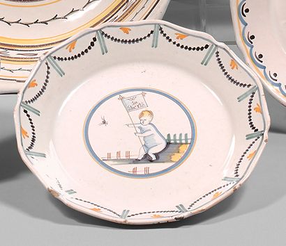 NEVERS Earthenware plate with contoured border, with polychrome decoration of a love...