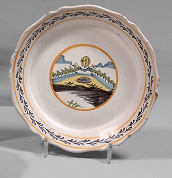NEVERS Earthenware plate with contoured edge, with polychrome decoration in a central...
