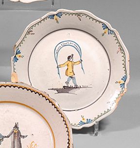 NEVERS Earthenware plate with contoured edge, with polychrome decoration of a peasant...