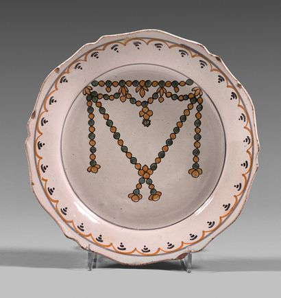 NEVERS Very rare earthenware plate with contoured border, with polychrome decoration...