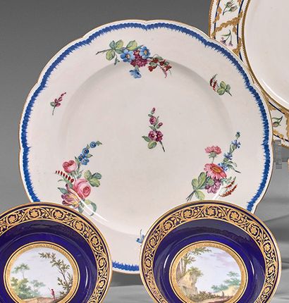SÈVRES A soft paste porcelain plate with a contoured border, decorated with polychrome...