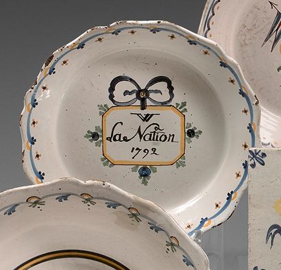 NEVERS Earthenware plate with contoured edge, polychrome decoration with an inscription...