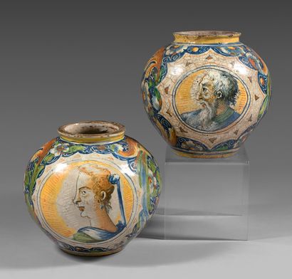 VENISE 
Pair of earthenware ball vases decorated in polychrome on the sides in medallions...