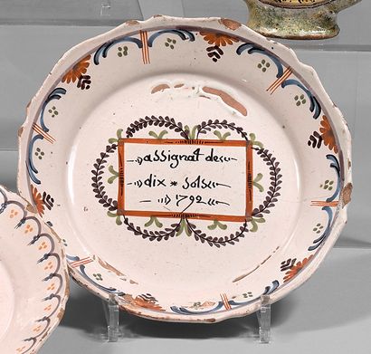 NEVERS Earthenware plate with contoured border, with polychrome decoration of a 10...