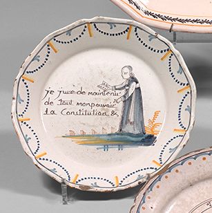 NEVERS Earthenware plate with a contoured border, with polychrome decoration called...