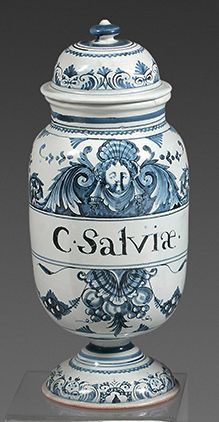 BORDEAUX Two covered earthenware medicine jars with blue monochrome decoration of...