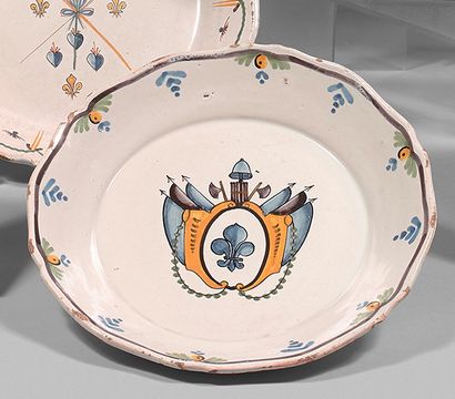 NEVERS Earthenware plate with contoured border, with polychrome decoration in a central...