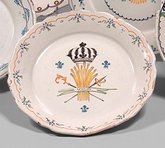 NEVERS Earthenware plate with contoured border, with polychrome decoration of a sheaf...