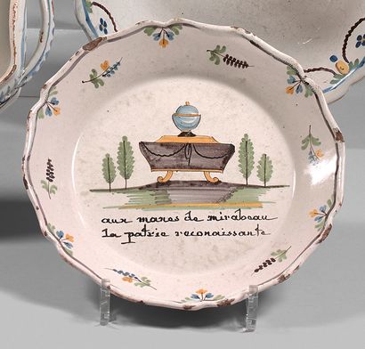 NEVERS Earthenware plate with contoured border, with polychrome decoration representing...