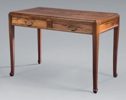 MAJORELLE Louis (1859-1926) 
Walnut desk with two drawers in the waist, slightly...