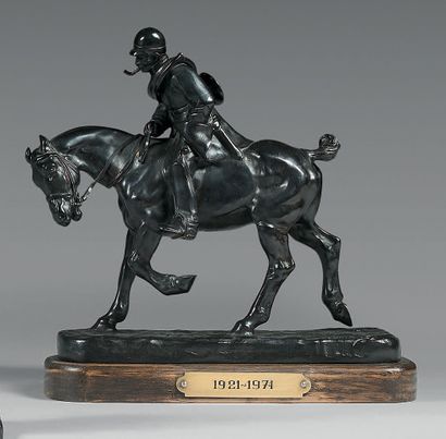 Gaston d'ILLIERS (1876-1932) 
Veneur à la pipe
Groupe en bronze à patine noire.
Signé...