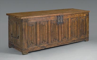 null Large moulded and carved oak chest decorated with ten panels with towel folds...