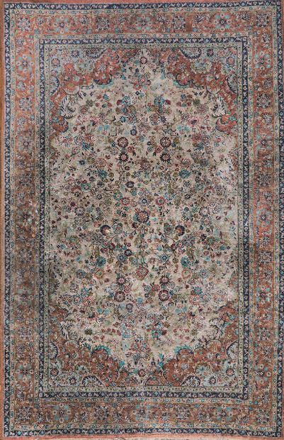 null Carpet with floral decoration on a beige silk background, spandrels and border...