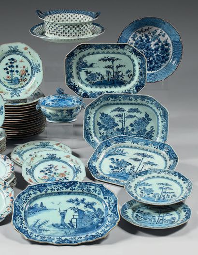 null A Chinese porcelain composite service, with blue and white decoration, in the...