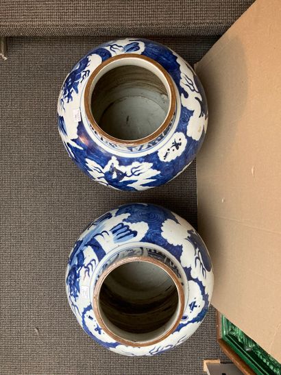 CHINE A pair of Guan porcelain jars of baluster form, decorated in blue underglaze...