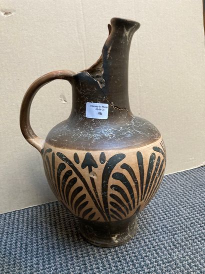  Oenochoe with a high gutter spout and a band of palmettes on the body. Pink terracotta...