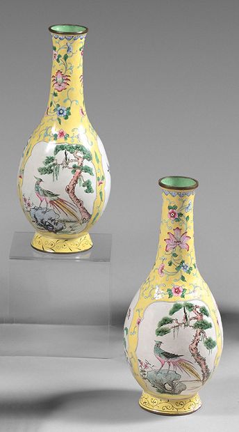 CHINE A pair of baluster vases with long narrow necks in enamels painted on copper...