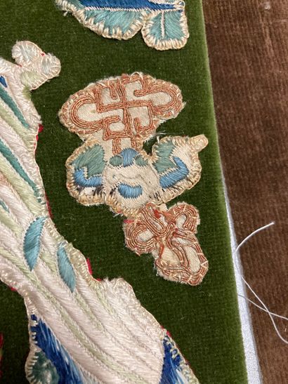 CHINE Silk dress elements sewn on a green velvet screen depicting flowers, rocks,...