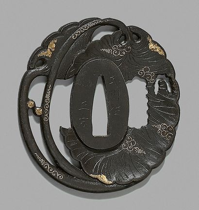 null Iron Tsuba with Asaret (AOI) leaves pattern and gold hira-zogan. Signed: BUSHU...