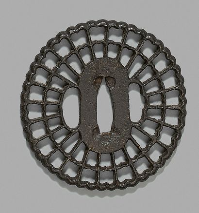 null Kyo-Sukashi iron tsuba with chrysanthemum leaves.
Edo, 18th-19th century.
D:...